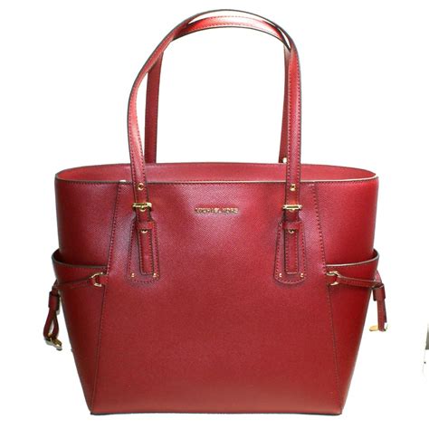 michael kors mens handbag accessories|Michael Kors maroon bag.